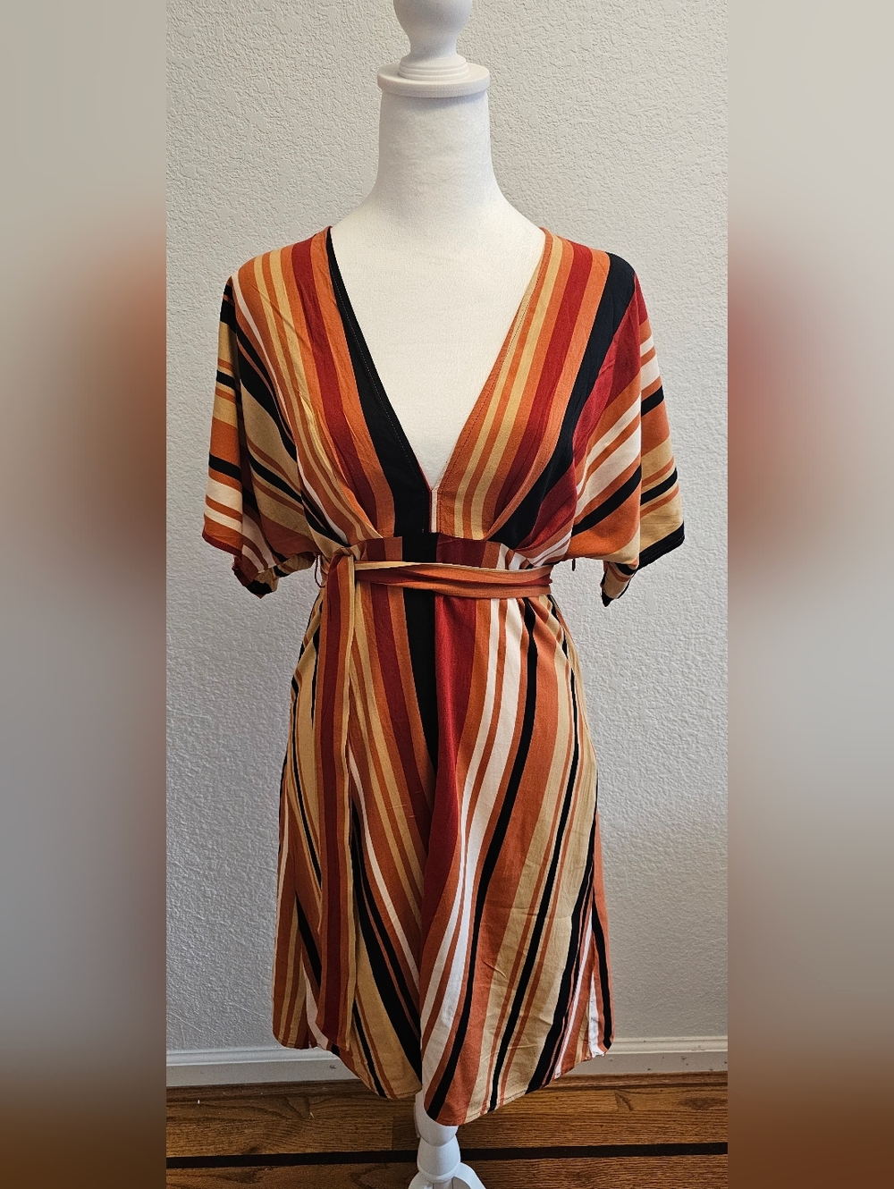 Black and orange, multi-striped dress. Striped V-Neck, Belted.